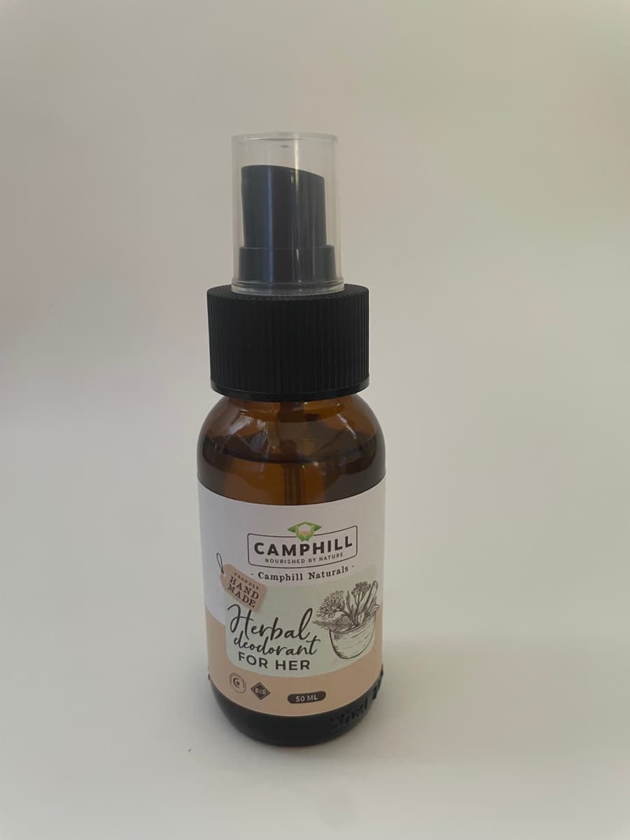 A 50ml amber spray bottle of Camphill Herbal Deodorant for Her.