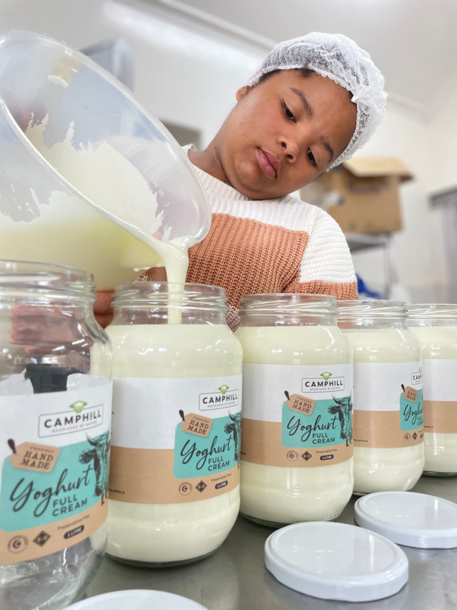 Pouring Fresh Camphill Dairy Yogurt